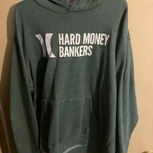 Green Hoodie, very comfortable. It’s in good condition, hasn’t been worn much.